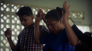 Movie still from “Loyle Carner - Georgetown” (2022), directed by Machine Operated – Close Up shot, High angle