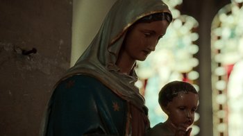 Movie still from “Loyle Carner - Georgetown” (2022), directed by Machine Operated – Close Up shot, Low angle