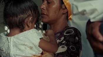 Movie still from “Loyle Carner - Georgetown” (2022), directed by Machine Operated – Extreme Close Up shot, High angle