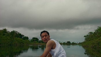 Movie still from “Loyle Carner - Georgetown” (2022), directed by Machine Operated – Medium shot, Low angle