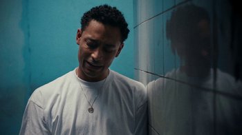 Movie still from “Loyle Carner - Georgetown” (2022), directed by Machine Operated – Close Up shot, Overhead angle