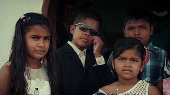 Movie still from “Loyle Carner - Georgetown” (2022), directed by Machine Operated – Close Up shot, High angle