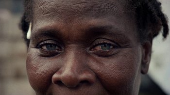 Movie still from “Loyle Carner - Georgetown” (2022), directed by Machine Operated – Extreme Close Up shot, High angle