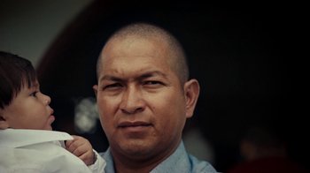 Movie still from “Loyle Carner - Georgetown” (2022), directed by Machine Operated – Close Up shot, High angle