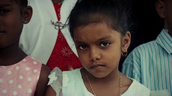 Movie still from “Loyle Carner - Georgetown” (2022), directed by Machine Operated – Close Up shot, High angle