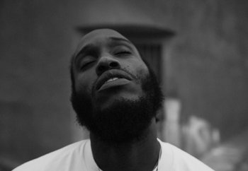 Movie still from “Maxo - 48” (2022), directed by Vincent Haycock – Extreme Close Up shot, Low angle