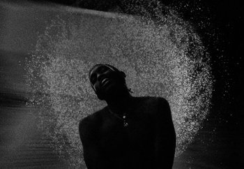 Movie still from “Maxo - 48” (2022), directed by Vincent Haycock – Medium shot, Overhead angle