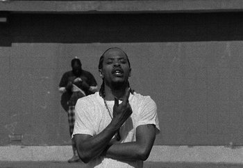 Movie still from “Maxo - 48” (2022), directed by Vincent Haycock – Medium shot, Low angle