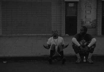 Movie still from “Maxo - 48” (2022), directed by Vincent Haycock – Medium shot, Low angle
