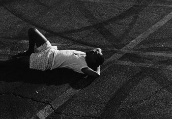 Movie still from “Maxo - 48” (2022), directed by Vincent Haycock – Medium shot, Overhead angle