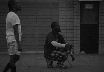 Movie still from “Maxo - 48” (2022), directed by Vincent Haycock – Wide shot, Low angle