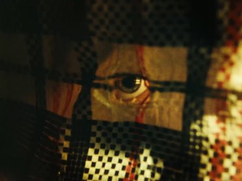 Movie still from “Black Midi - Sugar/Tzu” (2022), directed by Noel Paul – Extreme Close Up shot, Overhead angle