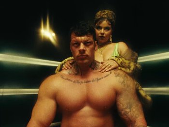 Movie still from “Black Midi - Sugar/Tzu” (2022), directed by Noel Paul – Medium shot, Low angle