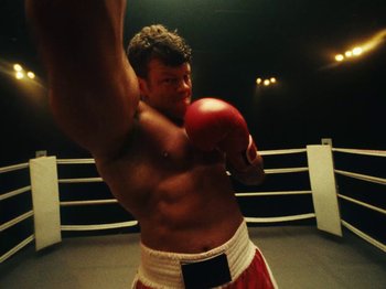 Movie still from “Black Midi - Sugar/Tzu” (2022), directed by Noel Paul – Medium shot, Low angle