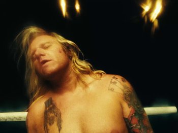 Movie still from “Black Midi - Sugar/Tzu” (2022), directed by Noel Paul – Medium shot, Overhead angle