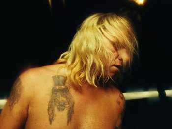 Movie still from “Black Midi - Sugar/Tzu” (2022), directed by Noel Paul – Close Up shot, Overhead angle