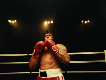 Movie still from “Black Midi - Sugar/Tzu” (2022), directed by Noel Paul – Medium shot, Low angle