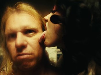 Movie still from “Black Midi - Sugar_Tzu” (2022), directed by Noel Paul – Extreme Close Up shot, Low angle