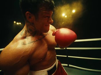 Movie still from “Black Midi - Sugar/Tzu” (2022), directed by Noel Paul – Medium shot, Low angle