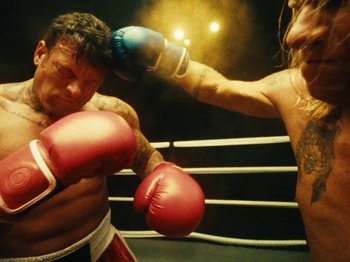 Movie still from “Black Midi - Sugar/Tzu” (2022), directed by Noel Paul – Medium shot, High angle