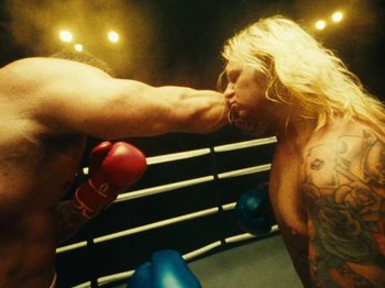 Movie still from “Black Midi - Sugar/Tzu” (2022), directed by Noel Paul – Medium shot, Over the shoulder angle