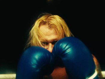 Movie still from “Black Midi - Sugar/Tzu” (2022), directed by Noel Paul – Extreme Close Up shot, Overhead angle