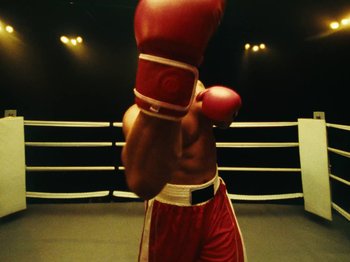 Movie still from “Black Midi - Sugar/Tzu” (2022), directed by Noel Paul – Medium shot, Low angle