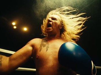 Movie still from “Black Midi - Sugar/Tzu” (2022), directed by Noel Paul – Medium shot, Low angle