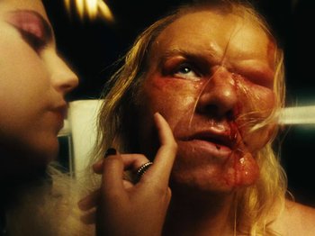 Movie still from “Black Midi - Sugar/Tzu” (2022), directed by Noel Paul – Extreme Close Up shot, Over the shoulder angle