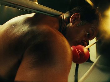 Movie still from “Black Midi - Sugar/Tzu” (2022), directed by Noel Paul – Close Up shot, Low angle