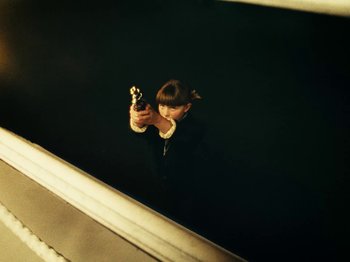 Movie still from “Black Midi - Sugar_Tzu” (2022), directed by Noel Paul – Medium shot, High angle