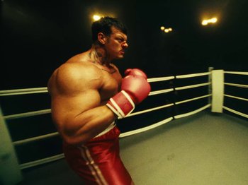 Movie still from “Black Midi - Sugar/Tzu” (2022), directed by Noel Paul – Medium shot, Low angle