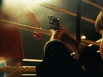 Movie still from “Black Midi - Sugar/Tzu” (2022), directed by Noel Paul – Extreme Close Up shot, High angle