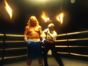 Movie still from “Black Midi - Sugar/Tzu” (2022), directed by Noel Paul – Medium shot, Low angle