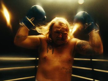 Movie still from “Black Midi - Sugar/Tzu” (2022), directed by Noel Paul – Medium shot, Low angle