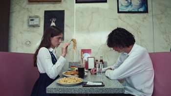 Movie still from “Glaive - Minnesota” (2022), directed by Ramez Silyan – Medium shot, Over the shoulder angle