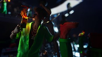 Movie still from “Pharrell - Cash In Cash Out” (2022), directed by François Rousselet – Wide shot, Low angle