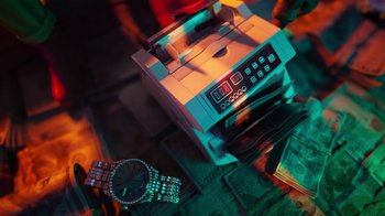 Movie still from “Pharrell - Cash In Cash Out” (2022), directed by François Rousselet – Extreme Close Up shot, Low angle