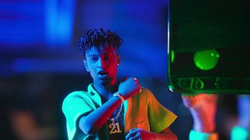 Movie still from “Pharrell - Cash In Cash Out” (2022), directed by François Rousselet – Medium shot, Low angle