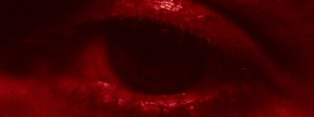 Movie still from “Jesse Jo Stark - So Bad” (2022), directed by Ramez Silyan – Extreme Close Up shot, Overhead angle