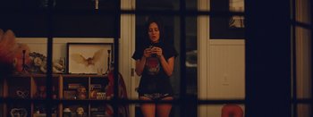 Movie still from “Jesse Jo Stark - So Bad” (2022), directed by Ramez Silyan – Medium shot, Low angle