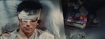 Movie still from “Jesse Jo Stark - So Bad” (2022), directed by Ramez Silyan – Close Up shot, Overhead angle