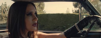 Movie still from “Jesse Jo Stark - So Bad” (2022), directed by Ramez Silyan – Close Up shot, High angle