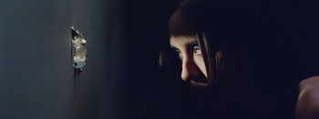 Movie still from “Jesse Jo Stark - So Bad” (2022), directed by Ramez Silyan – Extreme Close Up shot, Low angle