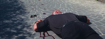 Movie still from “Jesse Jo Stark - So Bad” (2022), directed by Ramez Silyan – Extreme Close Up shot, Overhead angle