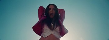 Movie still from “Jesse Jo Stark - So Bad” (2022), directed by Ramez Silyan – Medium shot, Low angle