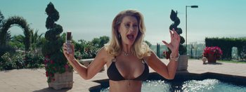 Movie still from “Jesse Jo Stark - So Bad” (2022), directed by Ramez Silyan – Medium shot, Low angle