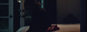 Movie still from “Jesse Jo Stark - So Bad” (2022), directed by Ramez Silyan – Extreme Close Up shot, Low angle