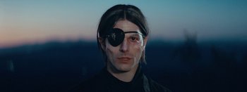 Movie still from “Jesse Jo Stark - So Bad” (2022), directed by Ramez Silyan – Close Up shot, High angle