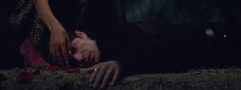 Movie still from “Jesse Jo Stark - So Bad” (2022), directed by Ramez Silyan – Close Up shot, High angle